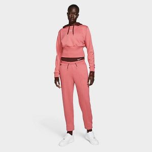 Nike Women&apos;s Sportswear Icon Clash Fleece Jogger Pants in Pink/Gypsy Rose Size Medium Cotton/Polyester/Fleece - 5796342