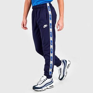 Nike Boys&apos; Sportswear Repeat Tape Jogger Pants in Blue/Blackened Blue Size XL Knit - 5778190