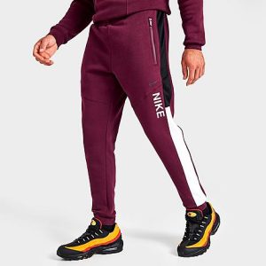 Nike Men&apos;s Sportswear Hybrid Fleece Jogger Pants in Red/Dark Beetroot Size XL Cotton/Polyester/Fleece - 5847609