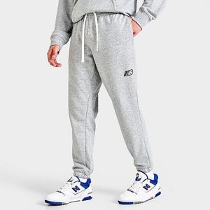 New Balance Men&apos;s NB Essentials Magnify Fleece Jogger Pants in Grey/Athletic Grey Size XL Cotton/Polyester/Fleece - 5823653