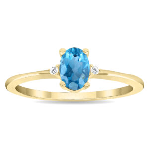 Women's Oval Shaped Blue Topaz and Diamond Classic Ring in 10K Yellow Gold- GRG61127BT